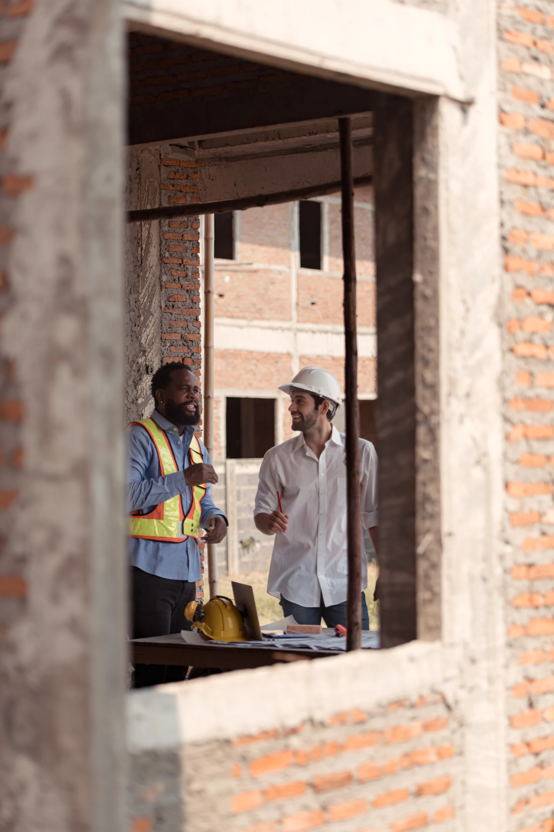 construction-site-conversation-between-two-men-2026-03-25-07-43-38-utc