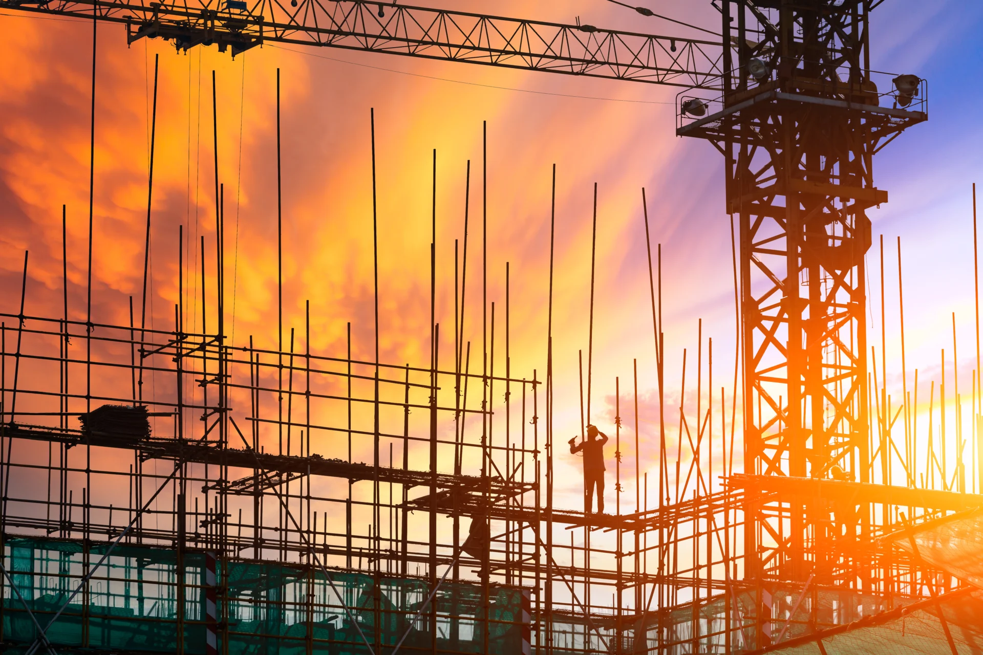 construction-workers-on-scaffolding-silhouetted-ag-2026-03-26-00-55-09-utc